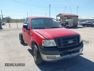 2005 Ford F-150 XL with VIN 1FTRF12255NA52941, listed as a IAAI auction lot 41657381 with 214,899 mi miles. Bid and sale history available at carsss.com. Image 1.