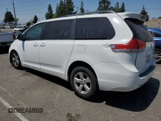 2014 Toyota Sienna LE AAS with VIN 5TDKK3DC8ES442280, listed as a Copart auction lot 59374985 with 207,563 mi miles and Salvage title. Bid and sale history available at DreamBid. Image 2.