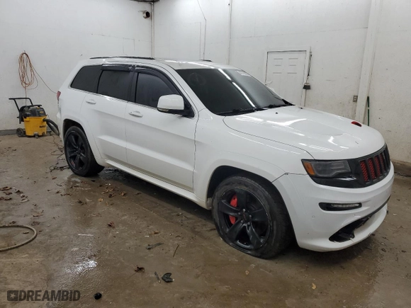 2015 Jeep Grand Cherokee SRT with VIN 1C4RJFDJ6FC902573, listed as a Copart auction lot 43718305 with 0 mi miles and Salvage Title. Bid and sale history available at carsss.com. Image 4.