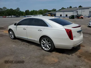 2014 Cadillac XTS Luxury z VIN 2G61M5S38E9215641, wystawiony jako Copart lot #53188695 z przebiegiem 97 431 mil mil oraz Szkody całkowita. Historia ofert i sprzedaży dostępna na DreamBid. Obrazek 2.