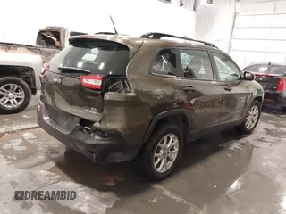 2015 Jeep Cherokee Sport with VIN 1C4PJMAB9FW595102, listed as a IAAI auction lot 41718244 with 95,059 mi miles. Bid and sale history available at carsss.com. Image 4.