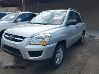 2009 Kia Sportage LX with VIN KNDJF724397572311, listed as a IAAI auction lot 41902158 with 120,899 mi miles and . Bid and sale history available at carsss.com. Image 2.