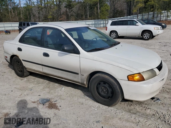 1998 Mazda Protege DX z VIN JM1BC1416W0194406, wystawiony jako Copart lot #44535955 z przebiegiem 312 942 mil mil oraz Szkoda całkowita • Salvage title. Historia ofert i sprzedaży dostępna na DreamBid. Obrazek 4.