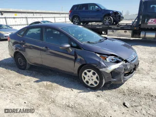2012 Ford Fiesta SE with VIN 3FADP4BJ7CM157588, listed as a Copart auction lot 52411945 with 124,989 mi miles and Salvage Title. Bid and sale history available at carsss.com. Image 4.