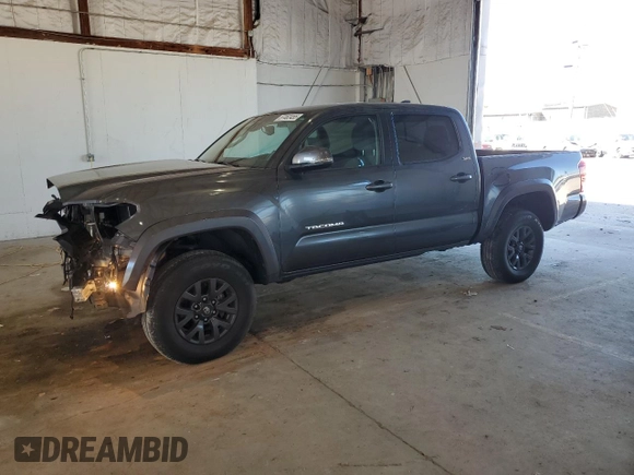 2023 Toyota Tacoma SR z VIN 3TMCZ5AN4PM599664, wystawiony jako Copart lot #57462455 z przebiegiem 65 736 mil mil oraz Szkoda całkowita • Salvage title. Historia ofert i sprzedaży dostępna na DreamBid. Obrazek 1.