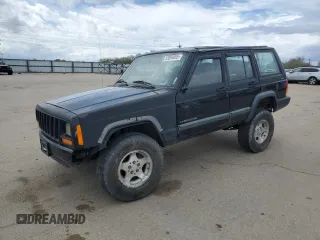 1998 Jeep Cherokee Sport with VIN 1J4FJ68S6WL188802, listed as a Copart auction lot 52094005 with 199,586 mi miles and Salvage Title. Bid and sale history available at carsss.com. Image 1.