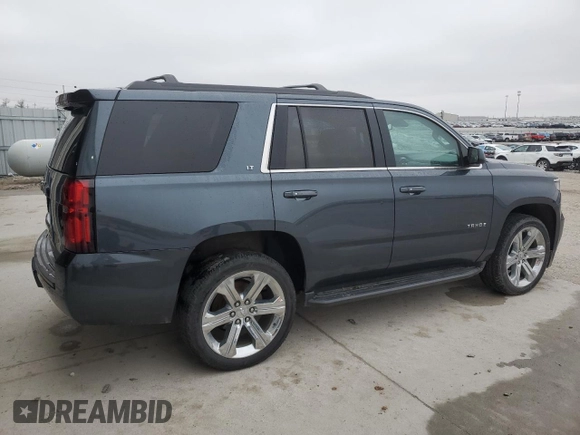 2019 Chevrolet Tahoe LT with VIN 1GNSKBKCXKR212450, listed as a Copart auction lot 54433205 with 119,907 mi miles and Salvage title. Bid and sale history available at DreamBid. Image 3.