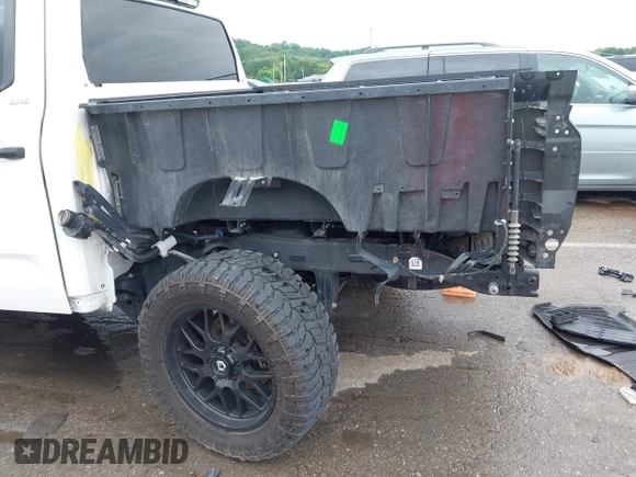 2023 Toyota Tundra SR5 with VIN 5TFLA5DB1PX070823, listed as a IAAI auction lot 42464005 with 41,772 mi miles and . Bid and sale history available at DreamBid. Image 6.