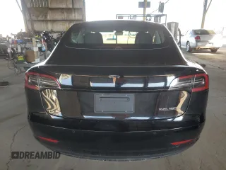 2021 Tesla Model 3 Performance with VIN 5YJ3E1EC0MF060360, listed as a Copart auction lot 43315195 with 28,726 mi miles and Salvage Title. Bid and sale history available at DreamBid. Image 6.