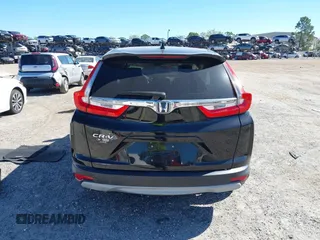 2017 Honda CR-V EX with VIN 7FARW1H52HE000353, listed as a IAAI auction lot 41824218 with 91,204 mi miles. Bid and sale history available at carsss.com. Image 16.