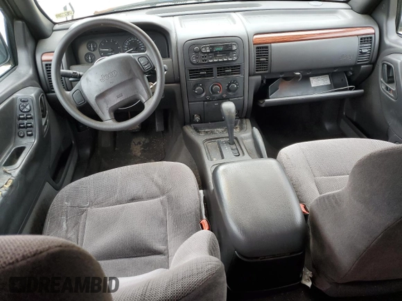 1999 Jeep Grand Cherokee Laredo с VIN 1J4G258S5XC795691, выставлен на аукционе Copart как лот 42556215 с пробегом 320 188 миль миль и Списание • Salvage title. История ставок и продаж доступна на DreamBid. Изображение 8.