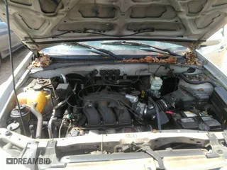 2006 Mazda Tribute LX with VIN 4F2YZ94156KM00763, listed as a IAAI auction lot 42019156 with 229,858 mi miles. Bid and sale history available at carsss.com. Image 10.