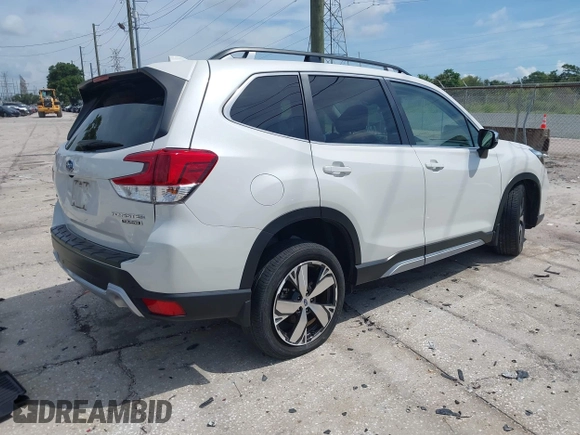 2021 Subaru Forester Touring with VIN JF2SKAXC8MH574427, listed as a IAAI auction lot 42529701 with 11,409 mi miles and . Bid and sale history available at DreamBid. Image 4.
