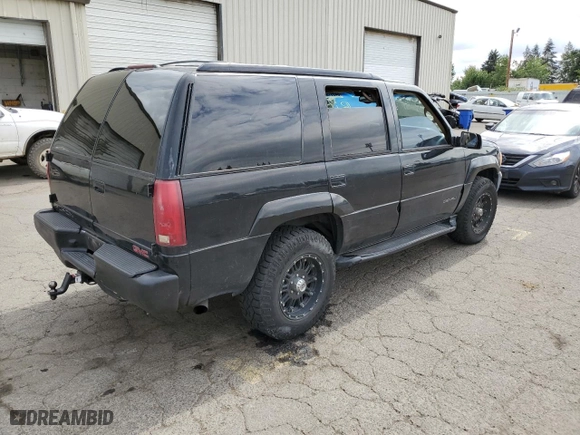 1999 GMC Denali with VIN 1GKEK13R1XR917376, listed as a Copart auction lot 64991924 with 247,231 mi miles and Clean Title. Bid and sale history available at carsss.com. Image 3.