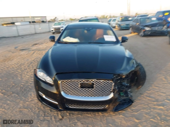 2018 Jaguar XJ with VIN SAJWJ2GD3J8W15092, listed as a IAAI auction lot 41844106 with 56,357 mi miles. Bid and sale history available at carsss.com. Image 12.