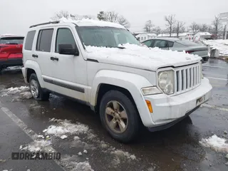 2011 Jeep Liberty Sport Jet with VIN 1J4PN2GK3BW587775, listed as a IAAI auction lot 41555089 with 126,921 mi miles and . Bid and sale history available at DreamBid. Image 1.