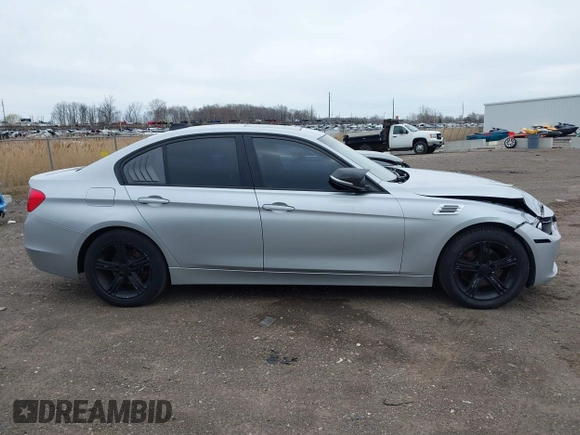 2014 BMW 3 Series 320i xDrive with VIN WBA3C3C58EP661364, listed as a IAAI auction lot 41947049 with 211,982 mi miles and . Bid and sale history available at DreamBid. Image 13.