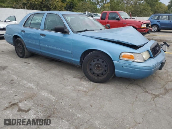 2004 Ford Police Interceptor Base w/3.27 Axle with VIN 2FAFP71W44X176595, listed as a Copart auction lot 72642164 with 136,019 mi miles and Salvage title. Bid and sale history available at DreamBid. Image 4.