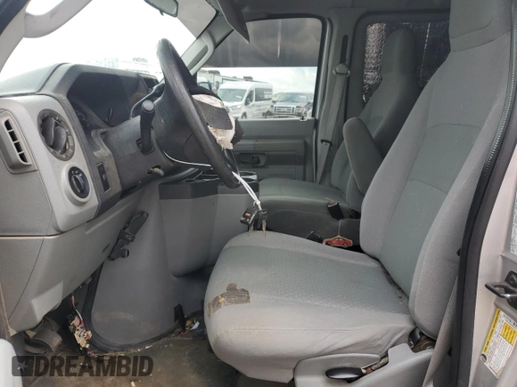 2011 Ford Econoline Passenger XL with VIN 1FBNE3BL8BDA53030, listed as a Copart auction lot 69919024 with 196,386 mi miles and Salvage Title. Bid and sale history available at DreamBid. Image 7.