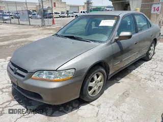 2000 Honda Accord SE z VIN 1HGCG5673YA090469, wystawiony jako IAAI lot #42391254 z przebiegiem 140 819 mil mil oraz . Historia ofert i sprzedaży dostępna na DreamBid. Obrazek 2.