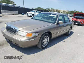 2001 Mercury Grand Marquis GS z VIN 2MEFM74W51X700247, wystawiony jako Copart lot #58212045 z przebiegiem 73 957 mil mil oraz Tytuł czysty. Historia ofert i sprzedaży dostępna na DreamBid. Obrazek 1.