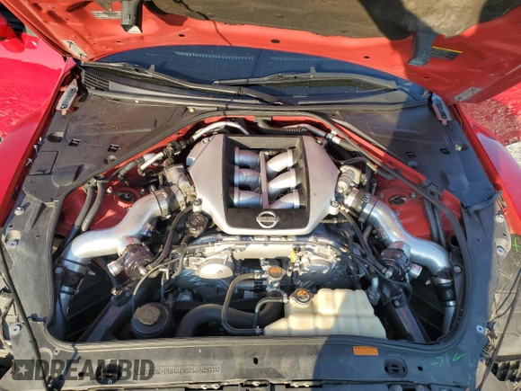 2010 Nissan GT-R Premium z VIN JN1AR5EF0AM230171, wystawiony jako Copart lot #66912074 z przebiegiem Nie podano mil oraz Szkody całkowita. Historia ofert i sprzedaży dostępna na DreamBid. Obrazek 11.