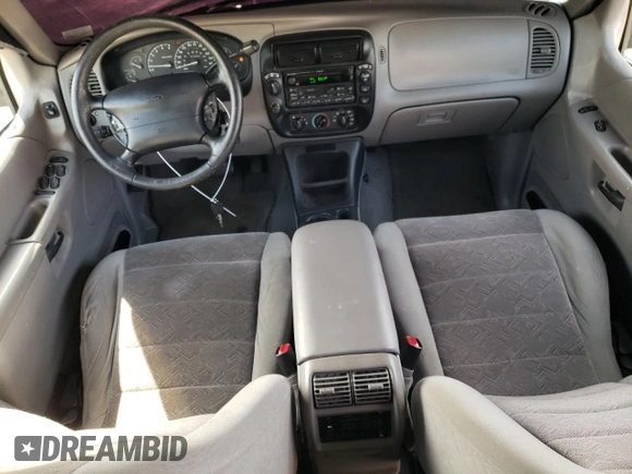 2000 Ford Explorer XLT z VIN 1FMZU73E9YZC08330, wystawiony jako Copart lot #50385865 z przebiegiem 157 065 mil mil oraz Szkoda całkowita • Salvage title. Historia ofert i sprzedaży dostępna na DreamBid. Obrazek 8.