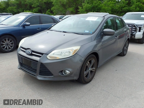 2012 Ford Focus SE with VIN 1FAHP3F25CL122340, listed as a IAAI auction lot 42070565 with 186,662 mi miles. Bid and sale history available at carsss.com. Image 2.