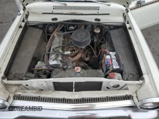 1964 Dodge Dart z VIN 7442677958, wystawiony jako Copart lot #81670574 z przebiegiem 61 374 mil mil oraz Tytuł czysty. Historia ofert i sprzedaży dostępna na DreamBid. Obrazek 11.