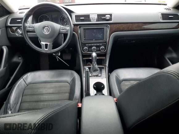 2014 Volkswagen Passat SEL Premium with VIN 1VWCN7A33EC109183, listed as a Copart auction lot 61369595 with 146,794 mi miles and Salvage title. Bid and sale history available at DreamBid. Image 8.