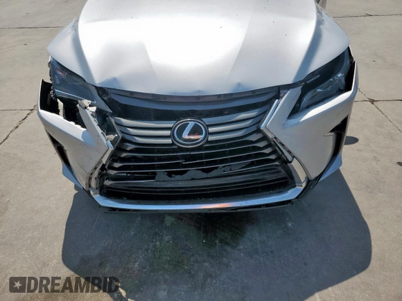2016 Lexus RX 350 with VIN 2T2ZZMCA3GC015256, listed as a Copart auction lot 51347515 with 122,284 mi miles and Salvage Title. Bid and sale history available at DreamBid. Image 14.