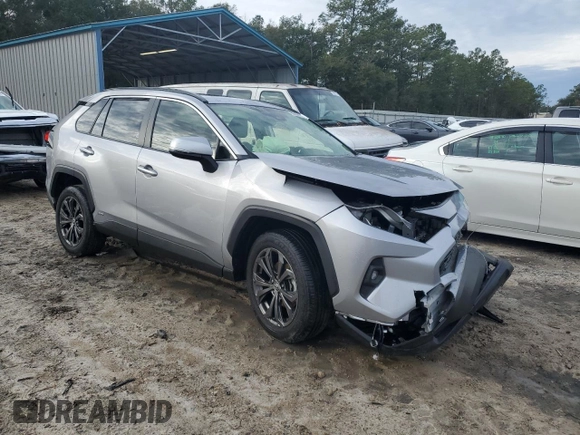 2023 Toyota RAV4 Hybrid XLE Premium z VIN JTMB6RFV8PD115723, wystawiony jako Copart lot #88005175 z przebiegiem 18 363 mil mil oraz Szkoda całkowita • Salvage title. Historia ofert i sprzedaży dostępna na DreamBid. Obrazek 4.