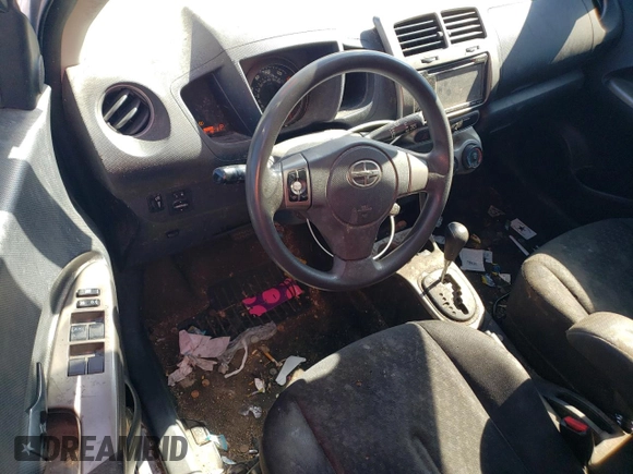 2012 Scion xD with VIN JTKKU4B48C1027734, listed as a Copart auction lot 73393334 with 231,371 mi miles and Salvage Title. Bid and sale history available at DreamBid. Image 8.