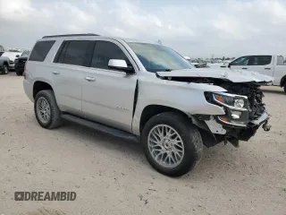 2020 Chevrolet Tahoe LS with VIN 1GNSCAKC9LR265813, listed as a Copart auction lot 51955445 with 63,647 mi miles and Salvage title. Bid and sale history available at DreamBid. Image 4.