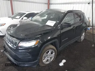 2023 Jeep Compass Latitude with VIN 3C4NJDBN4PT502817, listed as a IAAI auction lot 41650565 with 16,796 mi miles and . Bid and sale history available at DreamBid. Image 2.