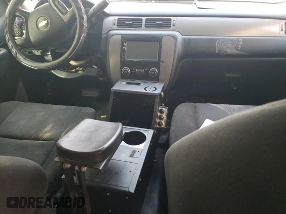 2013 Chevrolet Tahoe Commercial with VIN 1GNLC2E00DR304026, listed as a Copart auction lot 57041135 with 125,087 mi miles and Salvage title. Bid and sale history available at DreamBid. Image 8.