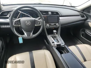 2017 Honda Civic EX-L z VIN 19XFC1F74HE014241, wystawiony jako Copart lot #59005745 z przebiegiem 55 629 mil mil oraz Czysty tytuł • Clean title. Historia ofert i sprzedaży dostępna na DreamBid. Obrazek 8.