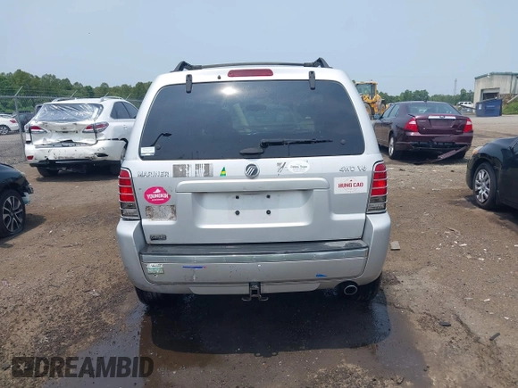 2005 Mercury Mariner Luxury z VIN 4M2CU57135DJ23718, wystawiony jako IAAI lot #42441869 z przebiegiem 179 378 mil mil oraz . Historia ofert i sprzedaży dostępna na DreamBid. Obrazek 16.