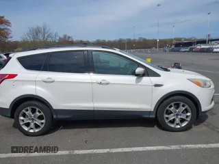 2013 Ford Escape SEL with VIN 1FMCU9HXXDUD82944, listed as a IAAI auction lot 42079667 with 97,304 mi miles. Bid and sale history available at carsss.com. Image 12.