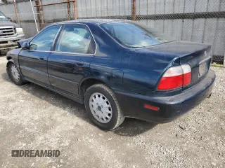 1997 Honda Accord EX with VIN 1HGCD5668VA262569, listed as a Copart auction lot 44713835 with 261,346 mi miles and Salvage Title. Bid and sale history available at DreamBid. Image 2.