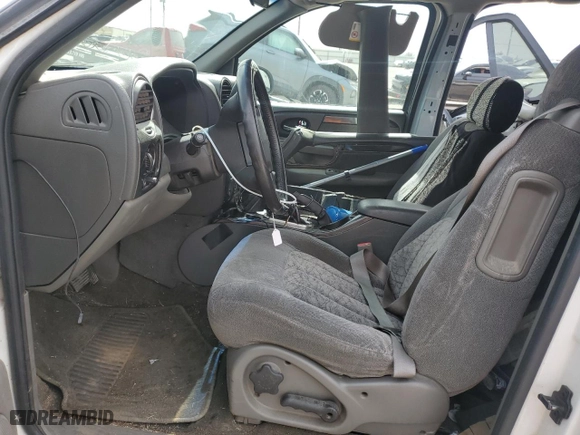2003 GMC Envoy SLE with VIN 1GKDS13SX32259798, listed as a Copart auction lot 48712015 with 100,330 mi miles and Salvage Title. Bid and sale history available at carsss.com. Image 7.