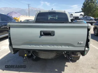 2022 Toyota Tacoma SR5 with VIN 3TMBZ5DN9NM033861, listed as a Copart auction lot 53704065 with 55,386 mi miles and Salvage title. Bid and sale history available at DreamBid. Image 6.