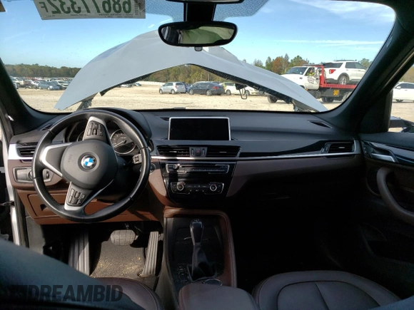 2017 BMW X1 sDrive28i with VIN WBXHU7C30H5H37516, listed as a Copart auction lot 68677332 with 0 mi miles. Bid and sale history available at carsss.com. Image 8.