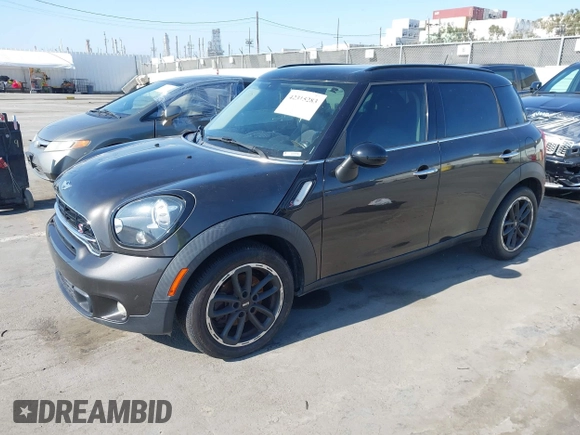2015 MINI Countryman S z VIN WMWZC3C55FWT01471, wystawiony jako IAAI lot #42315283 z przebiegiem 93 206 mil mil oraz . Historia ofert i sprzedaży dostępna na DreamBid. Obrazek 2.