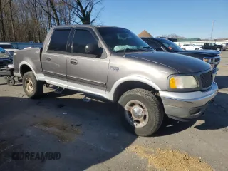 2002 Ford F-150 XLT with VIN 1FTRW08L62KB73629, listed as a Copart auction lot 83571304 with 201,816 mi miles and Salvage Title. Bid and sale history available at carsss.com. Image 4.