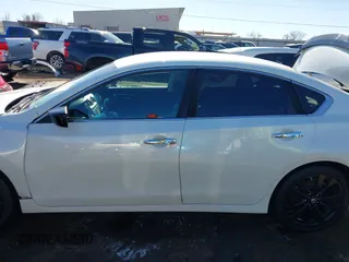 2017 Nissan Altima SV z VIN 1N4AL3AP6HC213060, wystawiony jako IAAI lot #41352725 z przebiegiem 163 692 mil mil oraz . Historia ofert i sprzedaży dostępna na DreamBid. Obrazek 14.