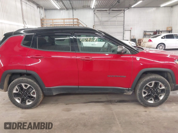 2018 Jeep Compass Trailhawk with VIN 3C4NJDDB7JT234551, listed as a IAAI auction lot 41695627 with 65,381 mi miles and . Bid and sale history available at carsss.com. Image 14.