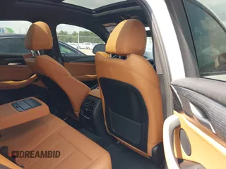 2023 BMW X4 xDrive30i с VIN 5UX33DT01P9S83083, выставлен на аукционе IAAI как лот 42252039 с пробегом Не указан миль и . История ставок и продаж доступна на DreamBid. Изображение 8.