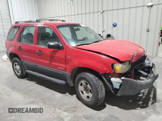 2001 Ford Escape XLS with VIN 1FMYU01181KD99269, listed as a Copart auction lot 88463335 with 217,537 mi miles and Salvage title. Bid and sale history available at DreamBid. Image 4.