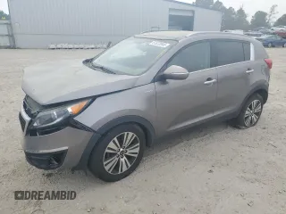 2015 Kia Sportage EX z VIN KNDPCCAC2F7713854, wystawiony jako Copart lot #51572045 z przebiegiem 124 803 mil mil oraz Szkoda całkowita • Salvage title. Historia ofert i sprzedaży dostępna na DreamBid. Obrazek 1.